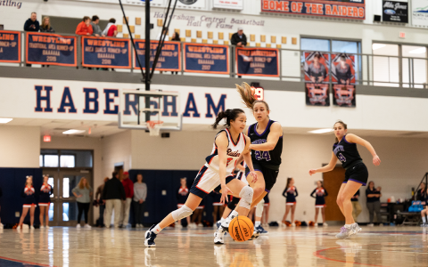 Lady Raiders Jazky Bantaum dribbles past a North Forsyth defender in Saturday night’s game. ZACH TAYLOR/Special