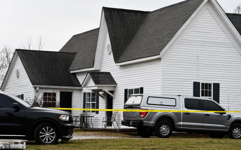 Law enforcement and fire personnel gathered Monday morning on Main Street in Cornelia to investigate a fire and a mysterious death. MATTHEW OSBORNE/Staff
