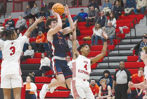 Habersham Central's Cole Gary floats in the air on the way to the basket Friday night.