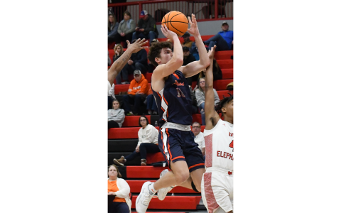 Habersham Central’s Cole Gary floats in the air to get a shot off Friday night against the Gainesville Red Elephants. MATTHEW OSBORNE/Staff