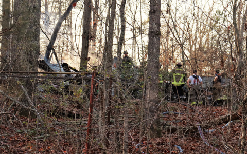 Habersham County Emergency Services personnel check for hot spots after extinguishing a fire at an unoccupied house on Wheeler Road in the Fairview community Wednesday afternoon. ROB MOORE/Habersham County 