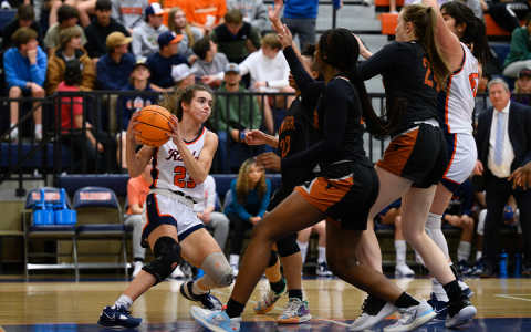 Habersham Central’s Kyia Barrett draws a crowd from the Lanier defense just before escaping it with an out-pass to Emyrie Combs. ZACH TAYLOR/Special