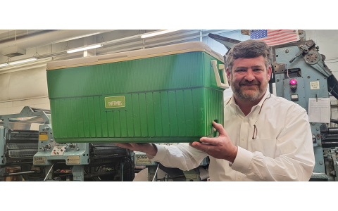 Alan NeSmith still has his old cooler from picnics with his grandparents. FILE