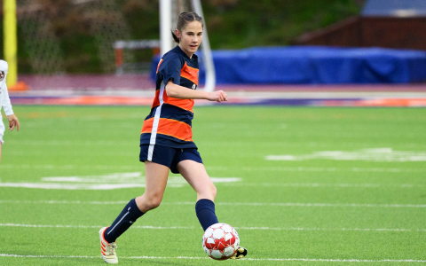 Eden Turner kicks the ball to her teammate in the first overtime period of the Lanier match. ZACH TAYLOR/Special