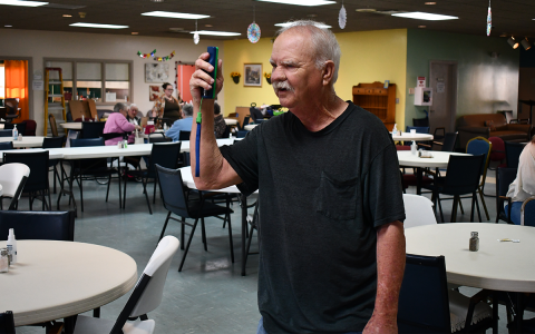 Kenneth Williams, a member of the Habersham King Pins, takes some time to practice his Wii Bowling skills on Tuesday. JOHN DILLS/Staff
