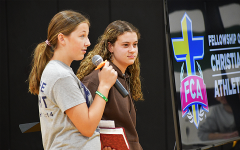 Tallulah Falls students Gracie Gunter and Carsyn Griffis gave testimony at Wednesday’s Fields of Faith FCA event. MATTHEW OSBORNE/Staff