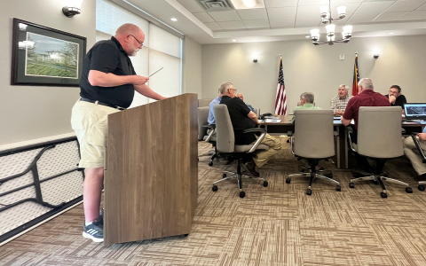 Bill Gresham reads his resignation to the Planning Commission on Tuesday night. JOHN DILLS/Staff