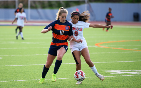 Raiders midfielder Addi Banks (10) fights to keep possession of the ball against Gainesville. ZACH TAYLOR/Special