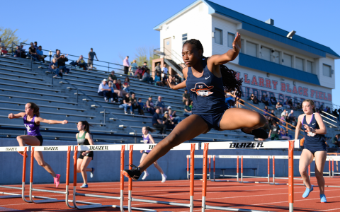Habersham Central’s Julia Johnson (right) crosses the last row of hurdles in heat two of the Battle of the Blue Ridge track meet. ZACH TAYLOR/Special