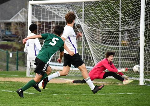 Tallulah Falls' Koen Eller watches his shot get past Darlington's goalkeeper during the first-round playoff win. MATTHEW OSBORNE/Staff