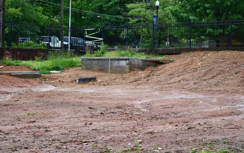 Demorest City Park is looking to upgrade restroom amenities, and where the previous restrooms sat is now an empty, fenced lot. JOHN DILLS/Staff