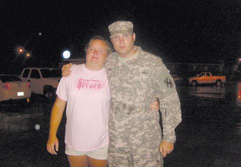Pam Wheeler gets in a hug with her son Michael McDonald before his deployment to Afghanistan in 2010. McDonald returned home but later took his own life.