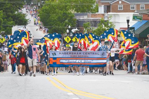 Habersham Central’s Band of Blue marched with an American theme for the Mountain Laurel Parade, with stars and stripes streamers twirling through the heart of Clarkesville. ZACH TAYLOR/Special