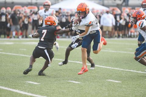 Not even grabbing the jersey of Habersham Central’s Zeke Whittington can slow him down. Whittington broke away here and still outran more defenders during Friday night’s spring game in Hartwell. TOM ASKEW/Special