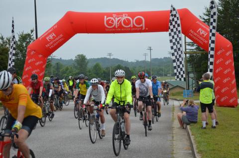 Riders with the Bike Ride Across Georgia (BRAG) spent Sunday night in Clarkesville before launching the next leg of their journey from the Ruby Fulbright Aquatic Center. MATTHEW OSBORNE and ZACH TAYLOR/Staff