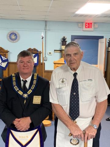 Pictured right is Brother Clarence Lewallen. 