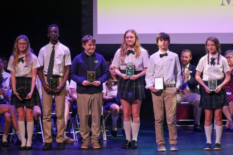 The Spirit of Rabun Gap award honorees were sixth-graders Asa White of Rabun Gap and Hattie Williams of Demorest; seventh-graders Harper Phillips of Rabun Gap and Camden Sherwood of Franklin; and eighth-graders Ayo Iyanda of Atlanta and Callie Parker of Franklin, N.C. Shown (from left) are Parker, Iyanda, Sherwood, Phillips, White and Williams.