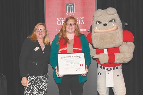 Emily Woodmaster (center) is recognized as a Certified Public Manager by the University of Georgia’s Carl Vinson Institute of Government. Woodmaster is the Chief Administrative Officer and City Clerk for the City of Baldwin. Pictured left to right are Marci Campbell and Hairy Dawg.