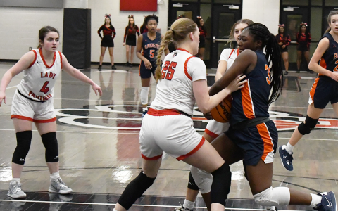 Habersham Central’s Sataria Cantrell battles in the lane against Gainesville High during her senior season. FILE