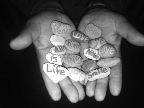 Troyce Simmons shows off some of his treasures used for Pebble Ministries. FILE