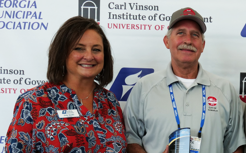 Cornelia Commissioner Mark Reed receives his award from Julie Smith, Mayor of Tifton and Immediate Past President of the Georgia Municipal Association. MARK REED/Submitted