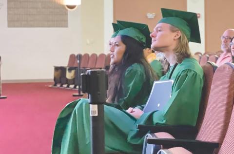 Graduates of Mountain Ed listen to a speaker at the ceremonies earlier this year. The specialized school was able to get a reprieve from the Georgia Assembly to continue serving  students who require an alternative to regular school education schedule. FILE