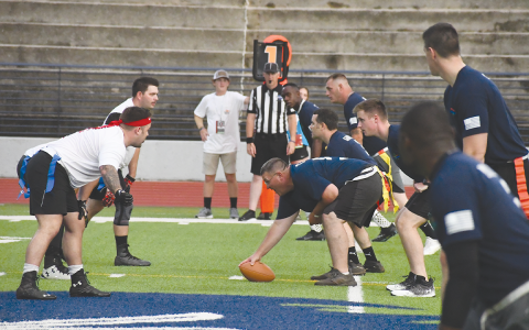 First responders line up for a play during last year’s Battle of the Heroes. FILE