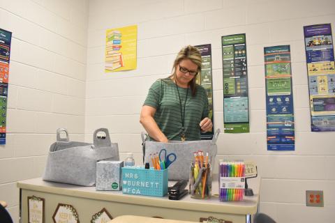 Habersham Central teacher Samantha  Burnett gets her supplies ready for the  upcoming first day for students on Friday. MATTHEW OSBORNE/Staff