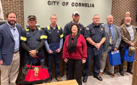 Cornelia Mayor John Borrow (left) – shown in 2021 presenting awards to longtime county employees Dale Herbert, Austin Hall, Diane Feorino, Justin Garrett, Josh Hazle, Donald Anderson and Butch Morgan – has made a connection with the community as mayor for the last 3 ½ years. FILE