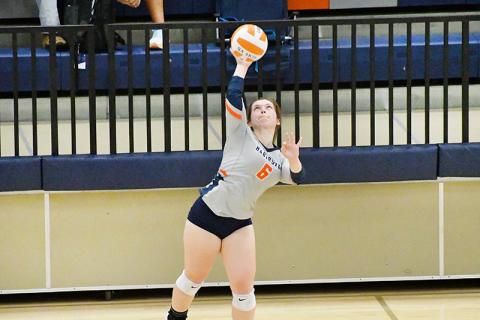 Habersham Central’s Callyn Chosewood serves during a recent home match. LANG STOREY/Staff