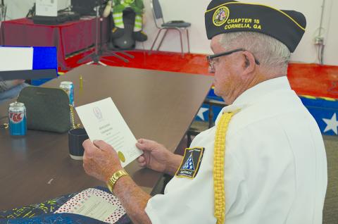 Habersham County veteran Ronnie Dotson reviews the paperwork that came with his Quilt of Honor. Veteran leaders have worked hard to honor those who have served and now are seeking to improve their healthcare. FILE