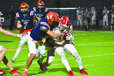 Habersham Central’s Zeke Whittington was one of several Raiders who asserted themselves on defense in Friday night’s win over Forsyth Central. LANG STOREY/Staff