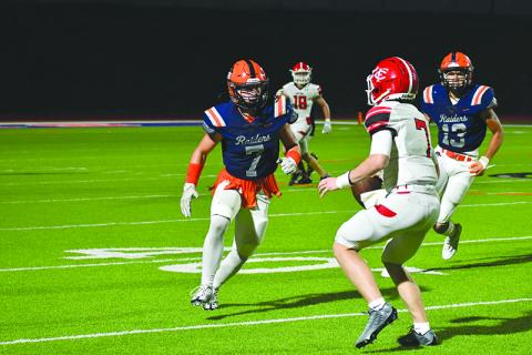 Habersham Central’s Braden Henslee sizes up Forsyth Central’s Drew Reid as he pursues during last Friday’s game. LANG STOREY/Staff