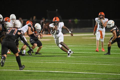 Habersham Central’s Antonio Cantrell finds daylight in the defensive line during Friday night’s game at Lanier. TOM ASKEW/Special