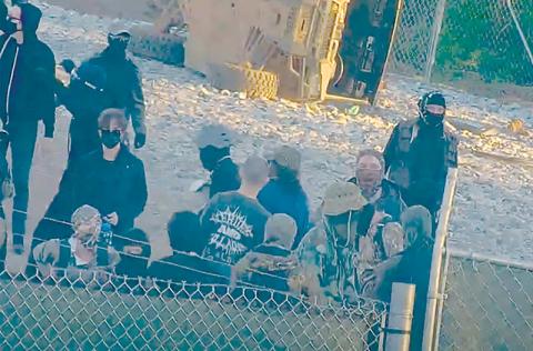 Protesters surrounded the "Cop City" training facility in DeKalb County in January. FILE