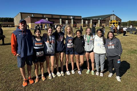 Habersham Central cross country team members shown are (from left) Coach Sebastian  Galloway, Titania Ramirez, Audrey Hotard, Leah Culpepper, Ember Ivester, Yamilez Otero, Abigail Hotard, Kailey Otero and Coach Kaylee Bosley. SUBMITTED