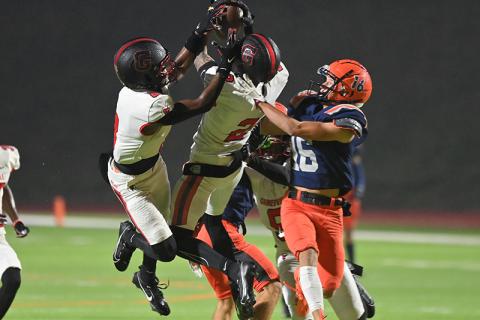 Gainesville’s Nicholas Taylor breaks up a pass intended for Habersham Central’s Maverick Chitwood (16) during Friday night’s game. TOM ASKEW/Special