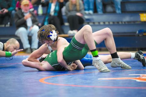 Habersham Central’s Westin Lakey earns a pinfall against North Hall last season. ZACH TAYLOR/FILE