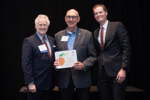 Rope Roberts (middle) receives his lifetime achievement award from Benjy Thompson, Chairman of the Georgia Economic Developers Association (left) and Grant Cagle, GEDA President & CEO. SUBMITTED