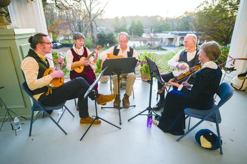 The Elderberries, comprised of Michael Daves, Elizabeth Crittenden, Larry King, Walter Daves and Jeanie Daves, provide entertainment for the Founders Ball celebrating Clarkesville’s Bicentennial year.