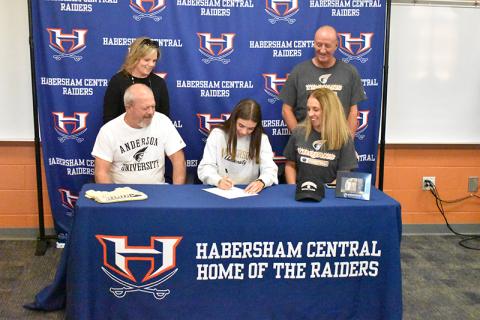 Habersham Central’s Kyia Barrett is joined by her parents at her signing ceremony for Anderson University basketball on Wednesday. Shown are (back row, from left) Deborah Barrett and Randy Edwards. Front row are (from left) Terry Barrett, Kyia and Tenille Edwards. MATTHEW OSBORNE/Staff
