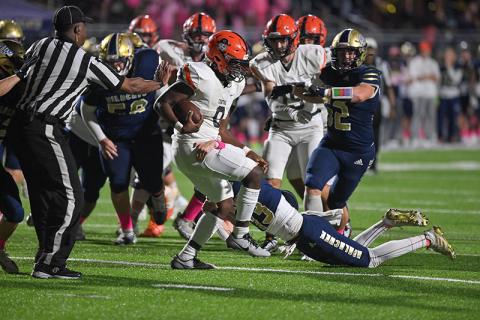 Habersham Central’s Antonio Cantrell does a two-step to escape an Apalachee tackle last Friday night. TOM ASKEW/Special