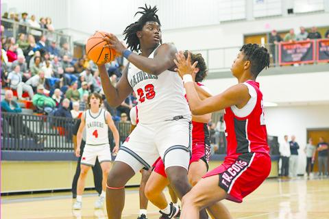JoJo McCurry begins to drive toward the net in the Flowery Branch matchup. TOM ASKEW/Special