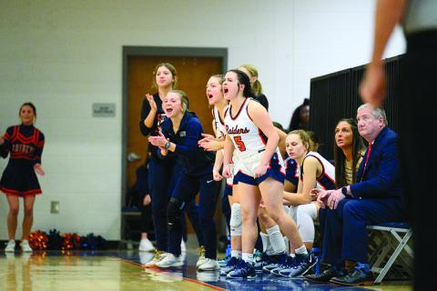 Oaklee Jackson (5) leads the way as the Lady Raiders’ bench supports their teammates on the floor during a recent win. ZACH TAYLOR/Special