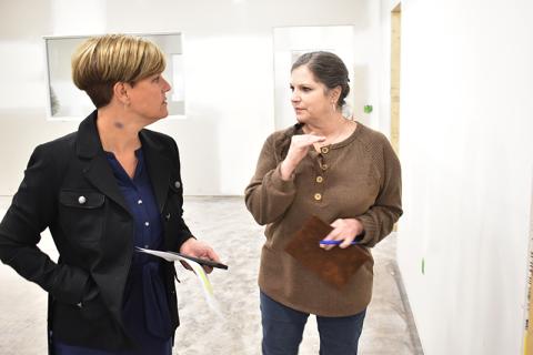 Habersham County Manager  Alicia Vaughn (left) and Elections Supervisor Laurel Ellison tour the new headquarters in Cornelia on Wednesday. MATTHEW OSBORNE/Staff