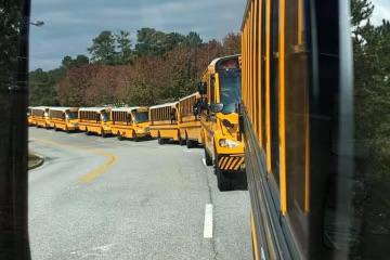 Habersham County School buses lineup to pick up students. SUBMITTED
