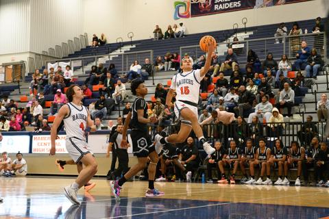 Habersham Central’s Jalen Davis floats to the rim for a layup on a fast break against Shiloh last week. ZACH TAYLOR/Special