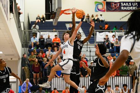 Shiloh’s Tylis Jordan gets his hand caught in the net trying to block Habersham Central’s Brannon Gaines during Wednesday’s game. ZACH TAYLOR/Special