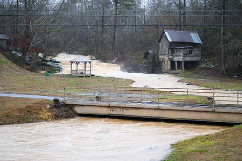 Loudermilk Mill on Highway 197 is flooded after the rain from Monday into Tuesday. The water level has risen and is close to reaching the bridge that leads to the home on the hill adjacent to the mill. ZACH TAYLOR/Special 