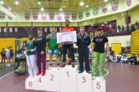 Habersham Central’s Justin Whitney got on the podium in third place in the 157-pound class at a tournament that featured 39 schools. SUBMITTED